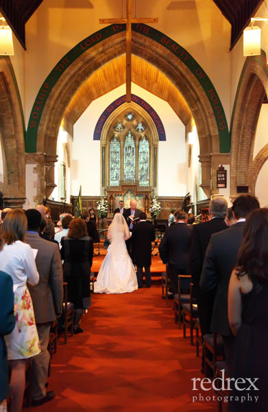 Cross of Christ above Wedding Service