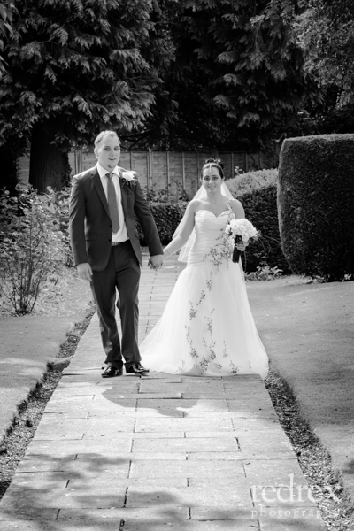 Whately Hall Hotel Gardens Wedding Couple walking