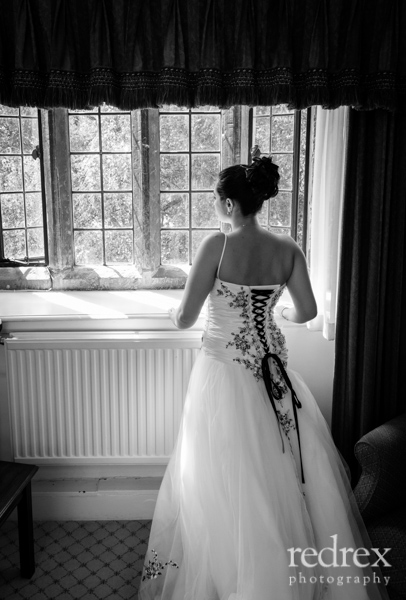 Whately Hall Hotel, Bride looking out of window