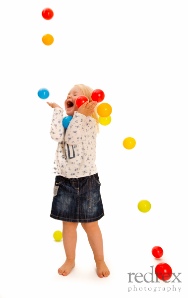 Toddler plastic balls studio shoot