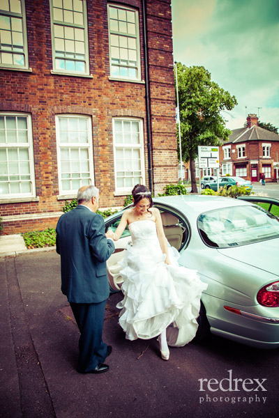 Bride and wedding car at the registry office